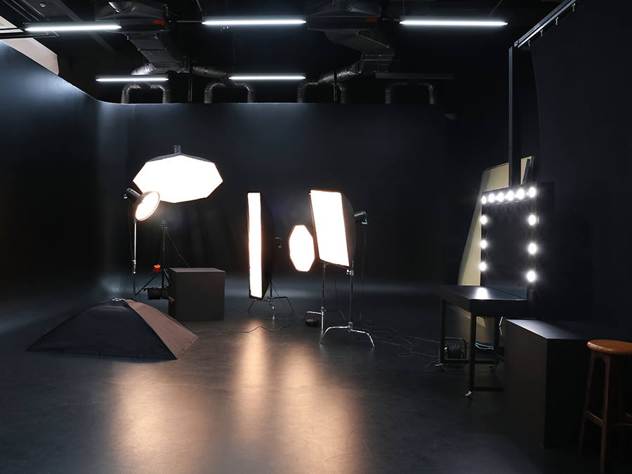 Interior of modern photo studio with professional photography equipment
