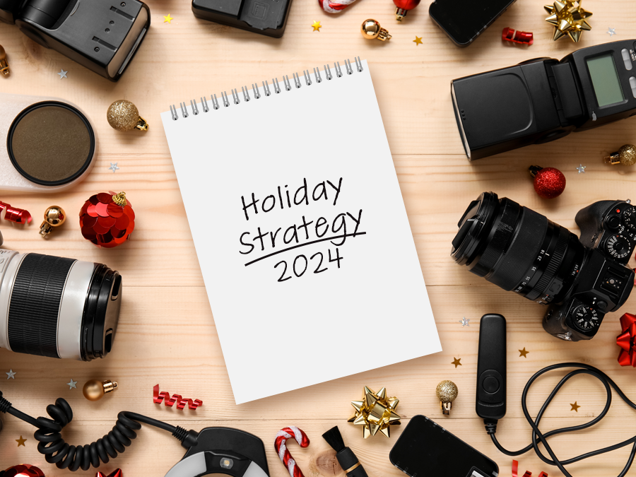 Array of camera gear and notebook.