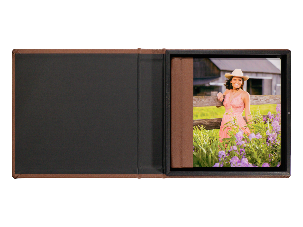 McKenna's Album Boxes can be made using the same leather that is used on your Integrity Album. This senior girl's album features a ChromaLuxe Image Cover paired with Genuine Brown Leather for the spine and back. The Album Box is also in the same leather.